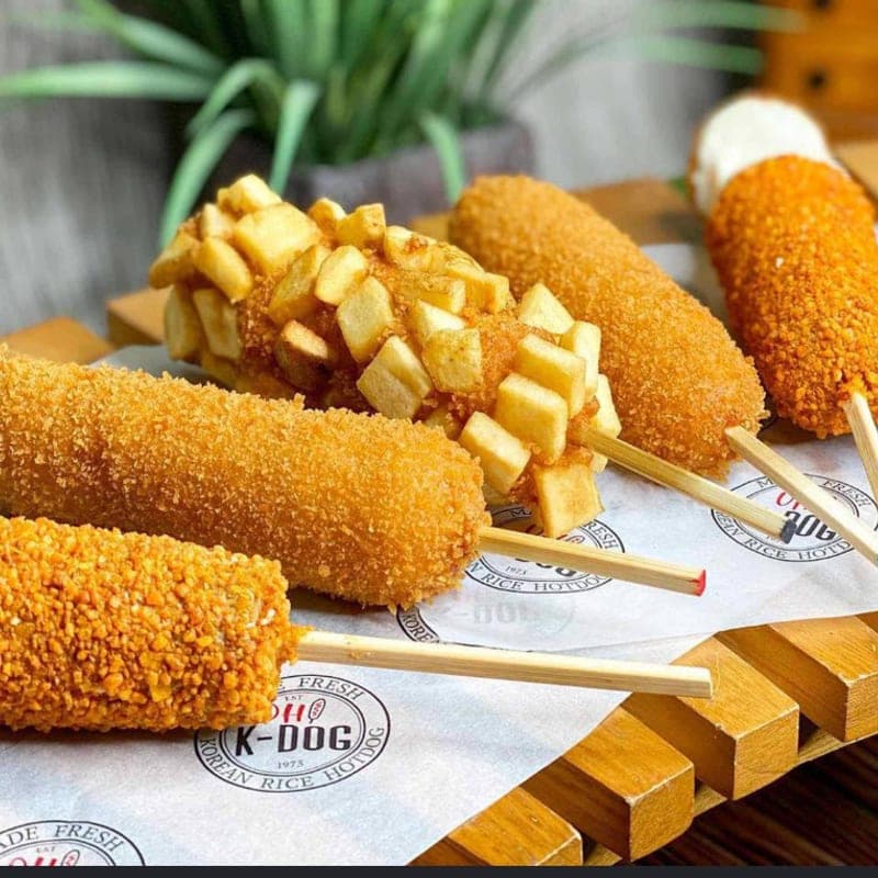 Fish cakes and a Korean corn dog from the food court at H Mart — Doraville