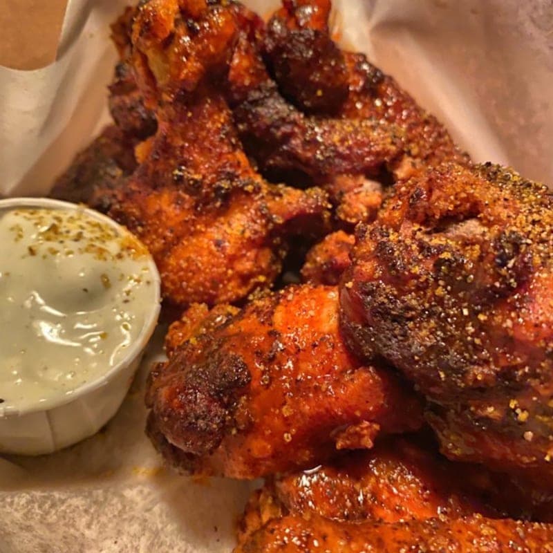 Wet lemon pepper wings at The Local